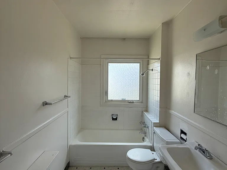 Bathroom w/ original tiles.