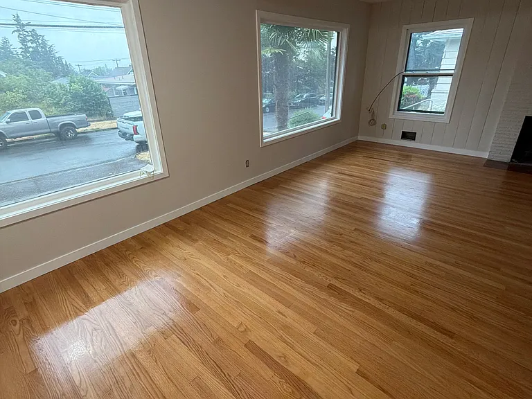 Living room from another angle. Windows look out on 66th.