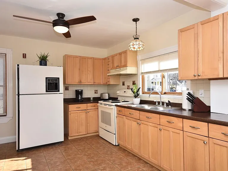 Kitchen with large refrigerator