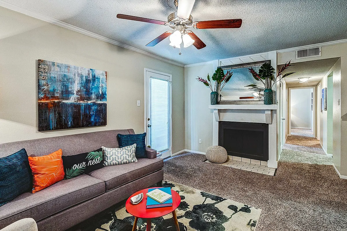 Living Area With Fireplace Hallway - Emberwood