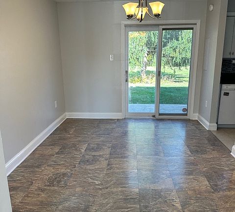 Dining room with slider access to patio