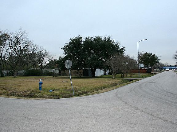 Looking down Maple Street with lot on the left.