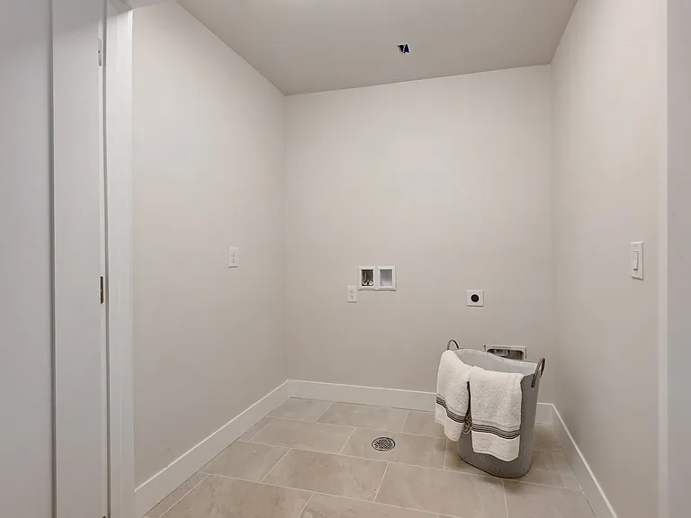 Laundry Room which now includes a Full Size Washer & Dryer