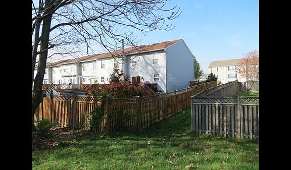 Back with fenced in yard