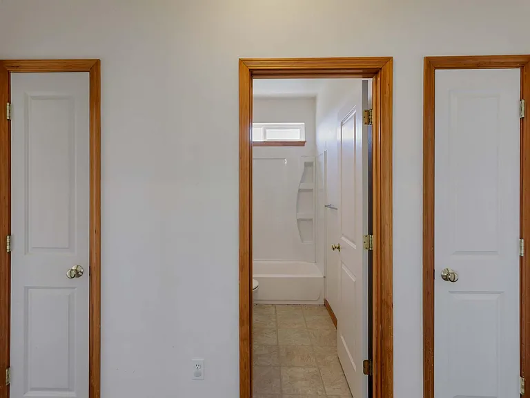 Hallway to bedroom 2 and 3 and the second bathroom