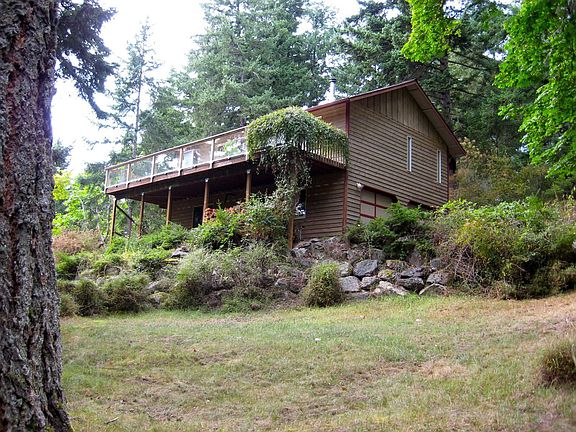 Backyard bordered by creek