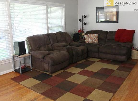 Bright. open and spacious great room with hardwood floors.