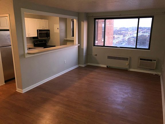 Open Family room/Kitchen with downtown views