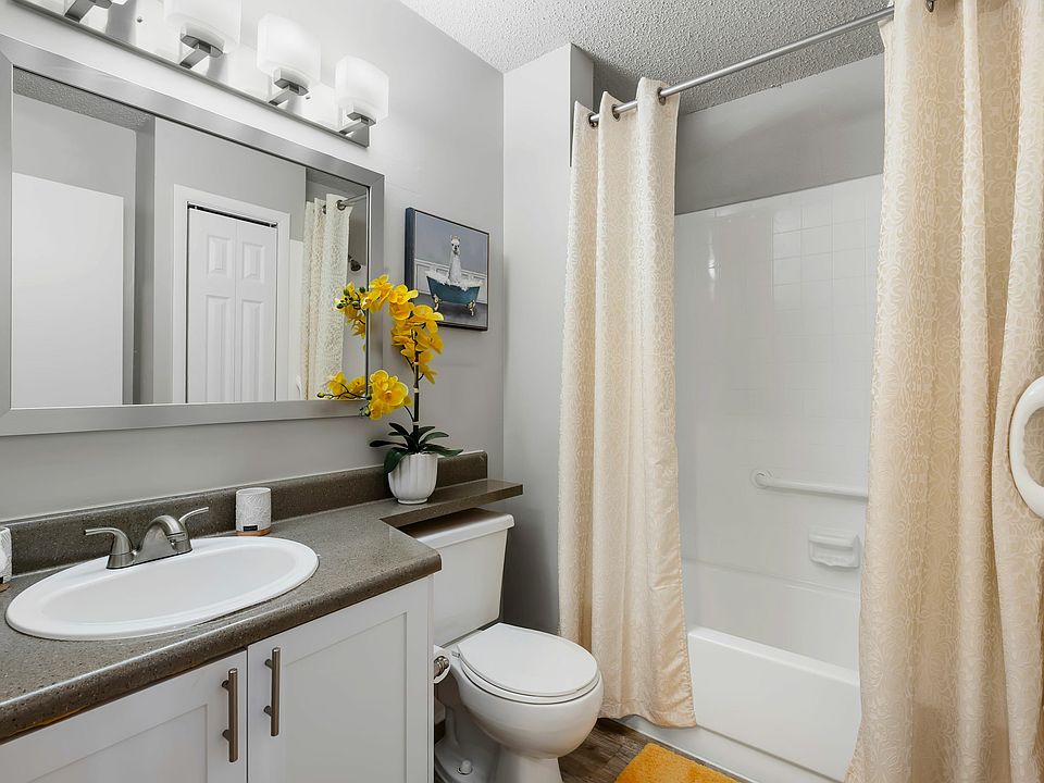 Bathroom with Framed Mirror and Extended Vanity