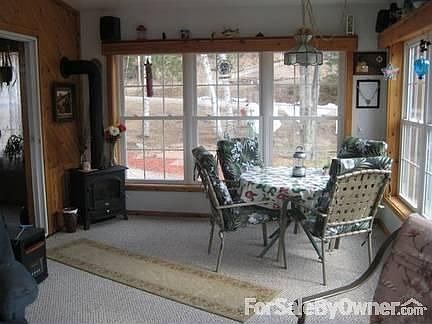 3 Season Room
						:
						Wooded view and dining area