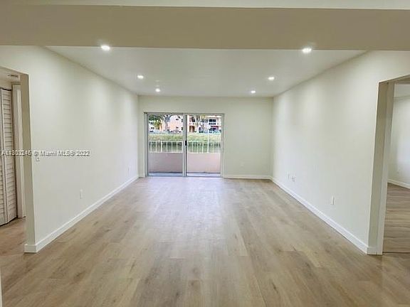 LIVING-DINING W/ NEW FLOOR.