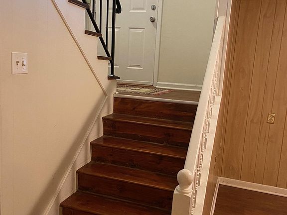 Split level stairs facing front door.