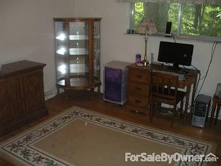Bedroom #2
						:
						Hardwood flooring...could make a nice den as well