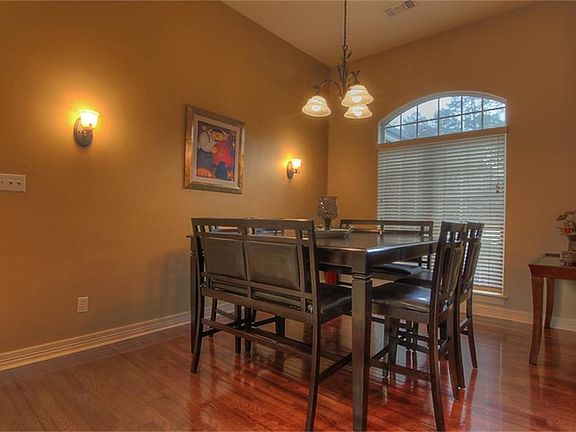 Elegant formal dining room with cherry hardwood floors!