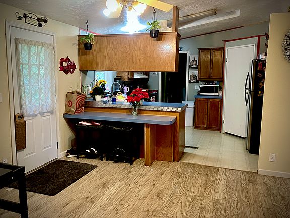 Kitchen area and outside entry.