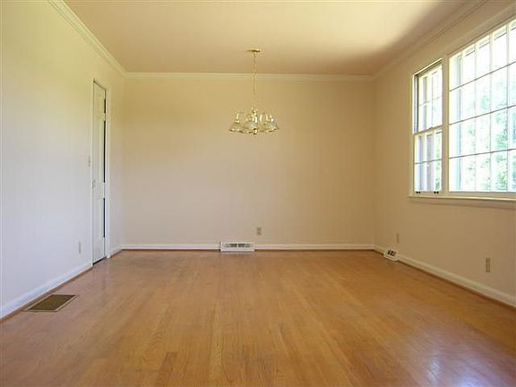 Dining room with great natural light & hardwood floors.