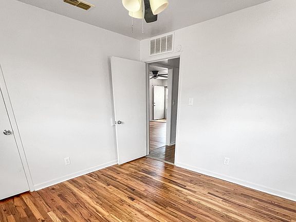 Two bedrooms with freshly refinished hardwood floors