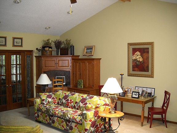 Stunning great room with cathedral ceiling, skylight, fireplace 