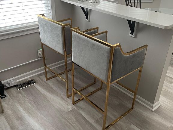 Bar in kitchen and downstairs family room. Barstools are for sale as home will be rented empty unless renter wants to purchase barstools separately.