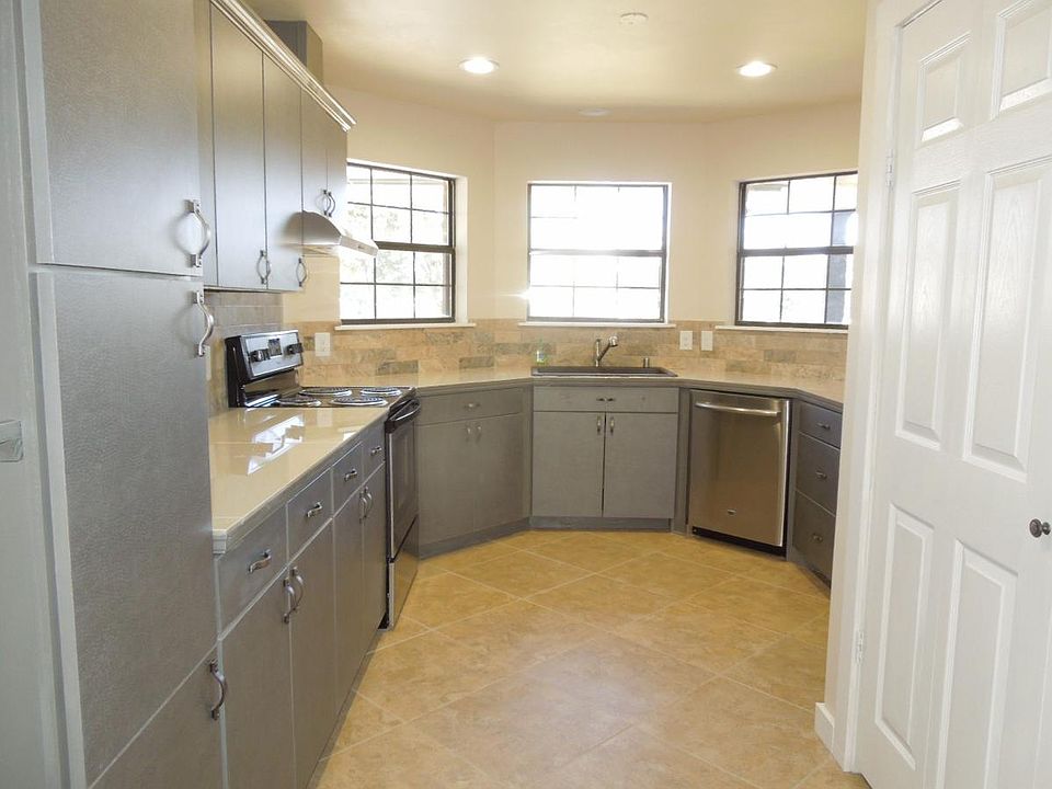 Updated modern kitchen, with stainless steel appliances.