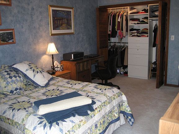 Bedroom with built-out closet