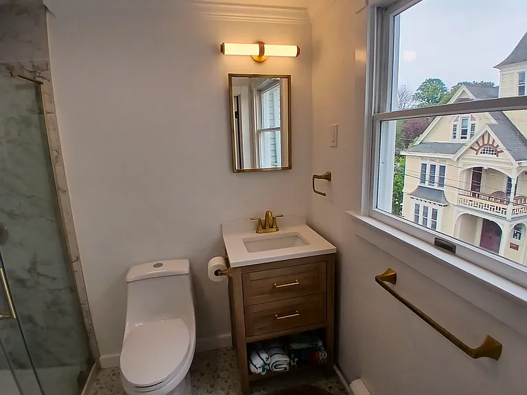 Bathroom with custom tiled shower