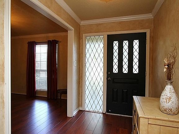 Entry w/ formal to the right.French doors could be added to convert to an executive office.