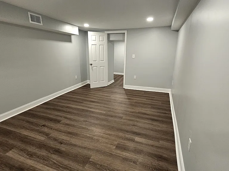 Family Room LL with Walk in Storage Closet