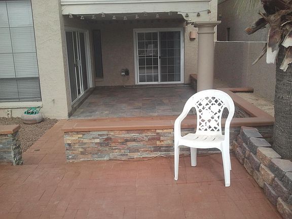 Covered patio off Living room and downstairs bedroom