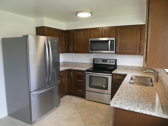 Kitchen with new appliances and granite countertops 
