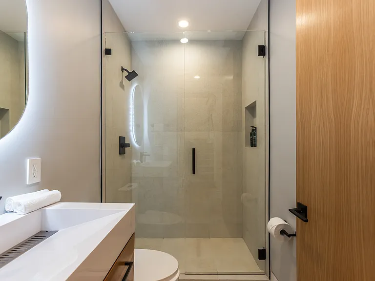 Bathroom one is shared between bedroom one and two.
