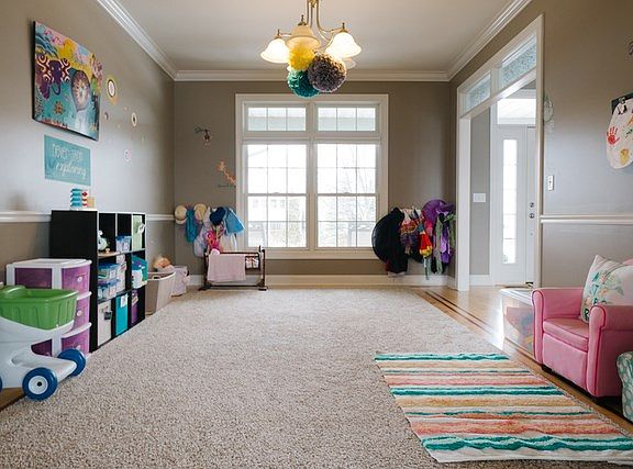 This also makes a great playroom with an opening to the kitchen.
