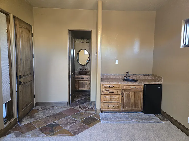 Casita mini kitchen looking into the room and bathroom