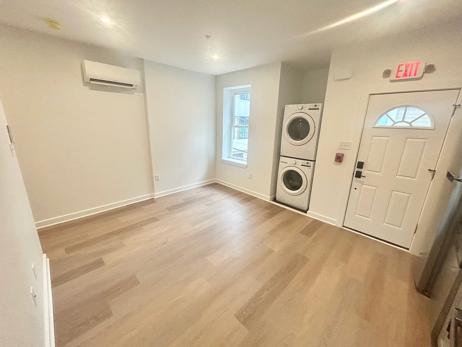 Brand-New 2-Bedroom Apartment with Central Air and In-Unit Laundry — Photo 2