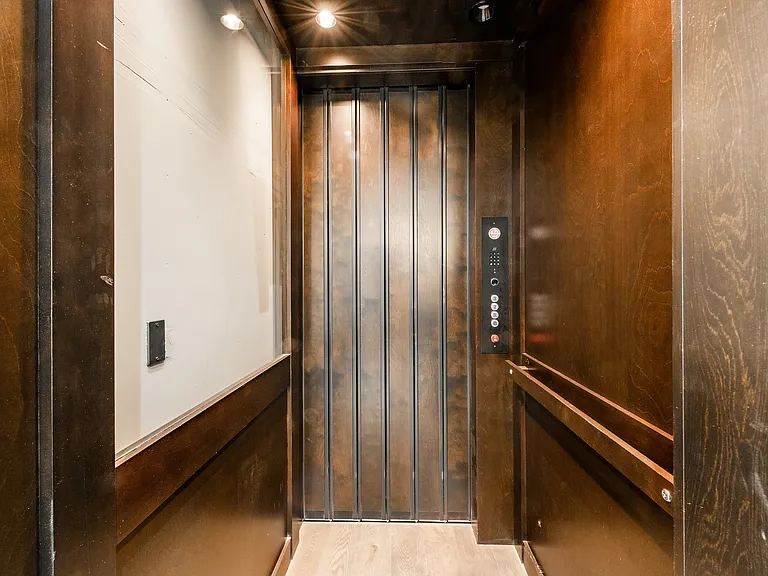 Elevator: 
Usage will depend on portion of the home you will be utilizing. This is used for owners to access cold storage and may not be available for guest use