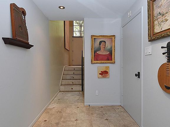 Facing the front door this is the hallway to the library/study on ground level.