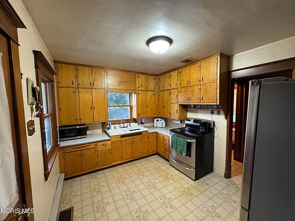 5th image of 8015 Road R #7