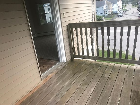 Second Floor Primary Entrance and Balcony (From Exterior)