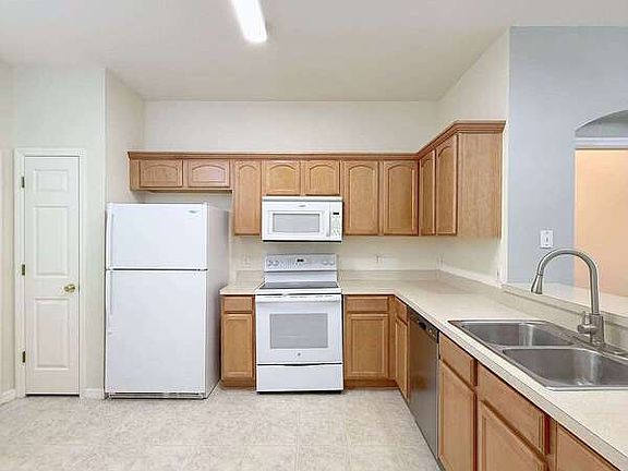 5th image of 9818 Fan Palm Way #1