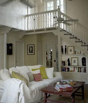 Great room with 16' ceiling, 2 ceiling fans, hardwood floors, and original staircase leading to landing to upstairs bedroom and French doors that open to upper deck with a beautiful sunset mountain view. Perfect for cozy, romantic and peaceful evenings.