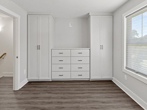Primary Bedroom with custom closets