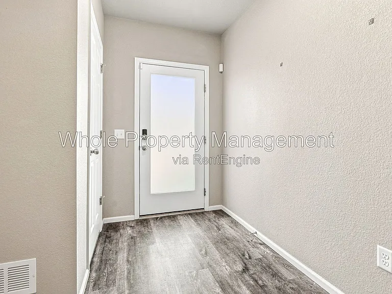 12231 W 57th Dr — Photo 2