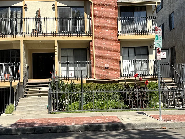 Front of Building with pics of all 4 balconies