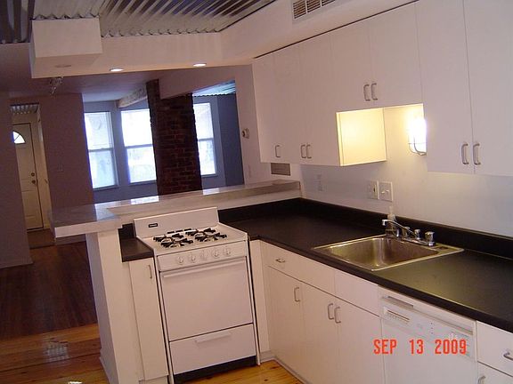 kitchen thru dining space to front room and entrance