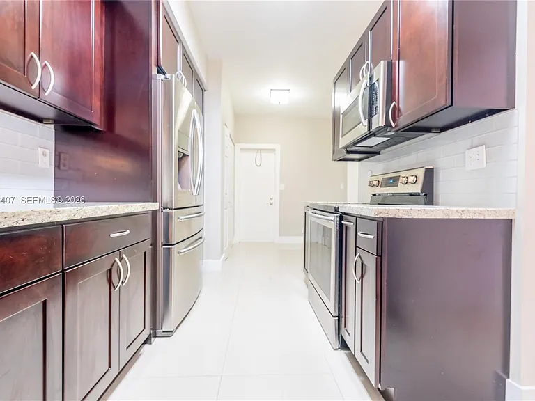 19160 NW 82nd Circle Ct #31L — Photo 13