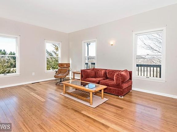 SPACIOUS Living Room with a SUNNY disposition!