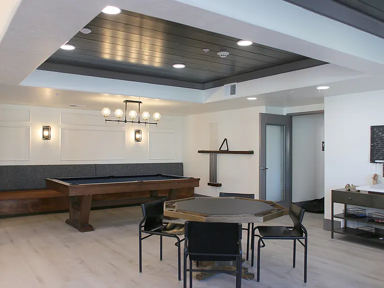 The clubhouse features a pool table, offering residents a great space to relax, entertain, and enjoy leisure time indoors.