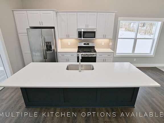 large island with multiple countertop and cabinet choices