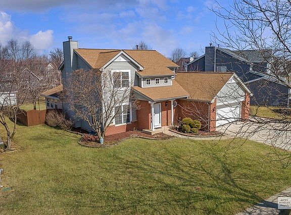 This Charmer Will Greet You With Wonderful Curb Appeal, Attractive Brick & Siding Color Scheme.