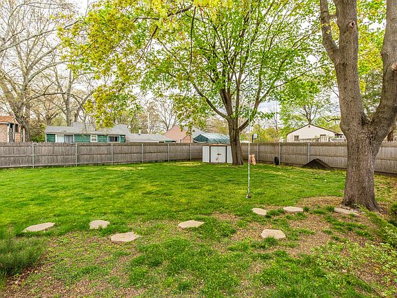 Fully fenced in large side yard